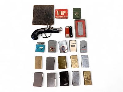 Twenty Lighters and a Wallet. Twenty Lighters and a Wallet This collection of lighters include 
