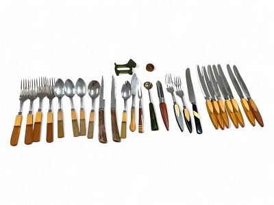 An Assortment of Bakelite Silverware, Serving Tools, and Items. An Assortment of Bakelite 