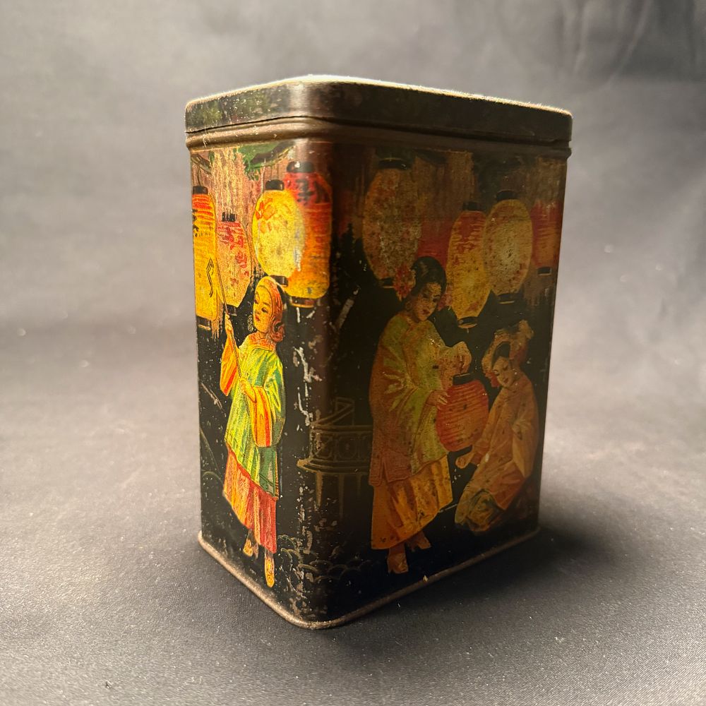 Lot 292: Asian Geisha Black Metal Litho Tea Tin