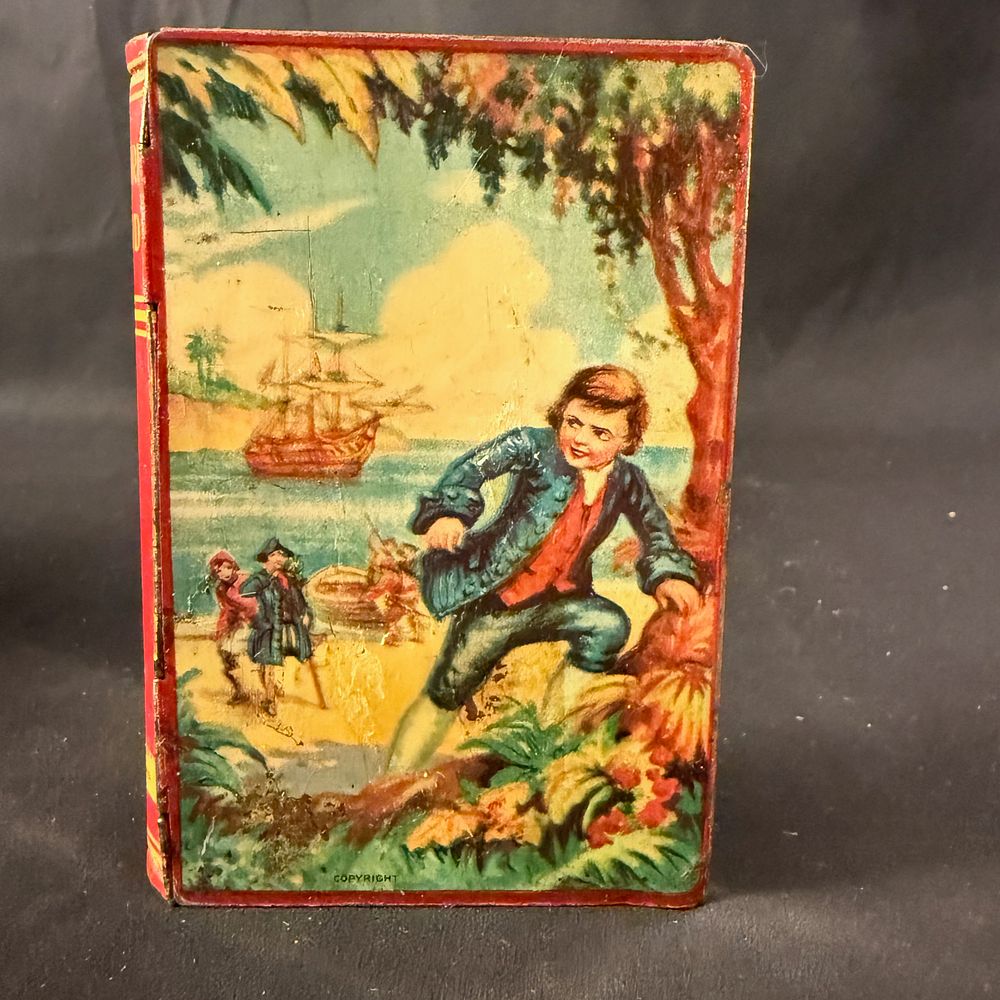 Lot 260: Chad Valley Treasure Island Book Shaped Tin