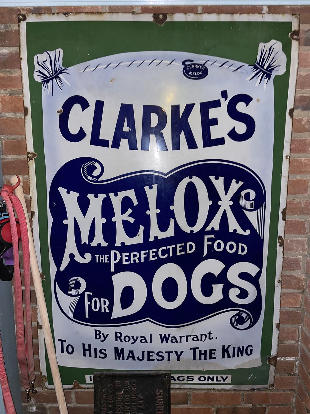 Lot 13: Large Victorian Clarkes Melox Dog Food Enamel Advertising Sign