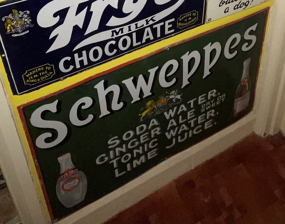 Lot 18: A Trio of Vintage Advertising Signs, including Schweppes and Fry's Chocolate
