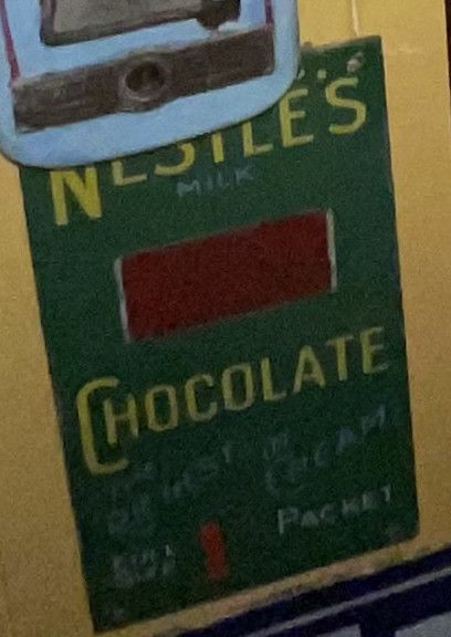 Lot 41: Vintage Nestle's Milk Chocolate Advertising Enamel Vending Machine Sign