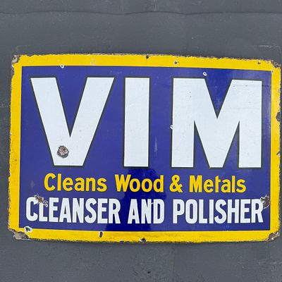 Vim Cleanser and Polisher Enamel Advertising Sign. Dark blue field with yellow border and large 