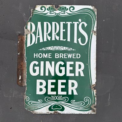 Barrett's Home Brewed Ginger Beer Enamel Advertising Sign. Deep green ground with white Art 