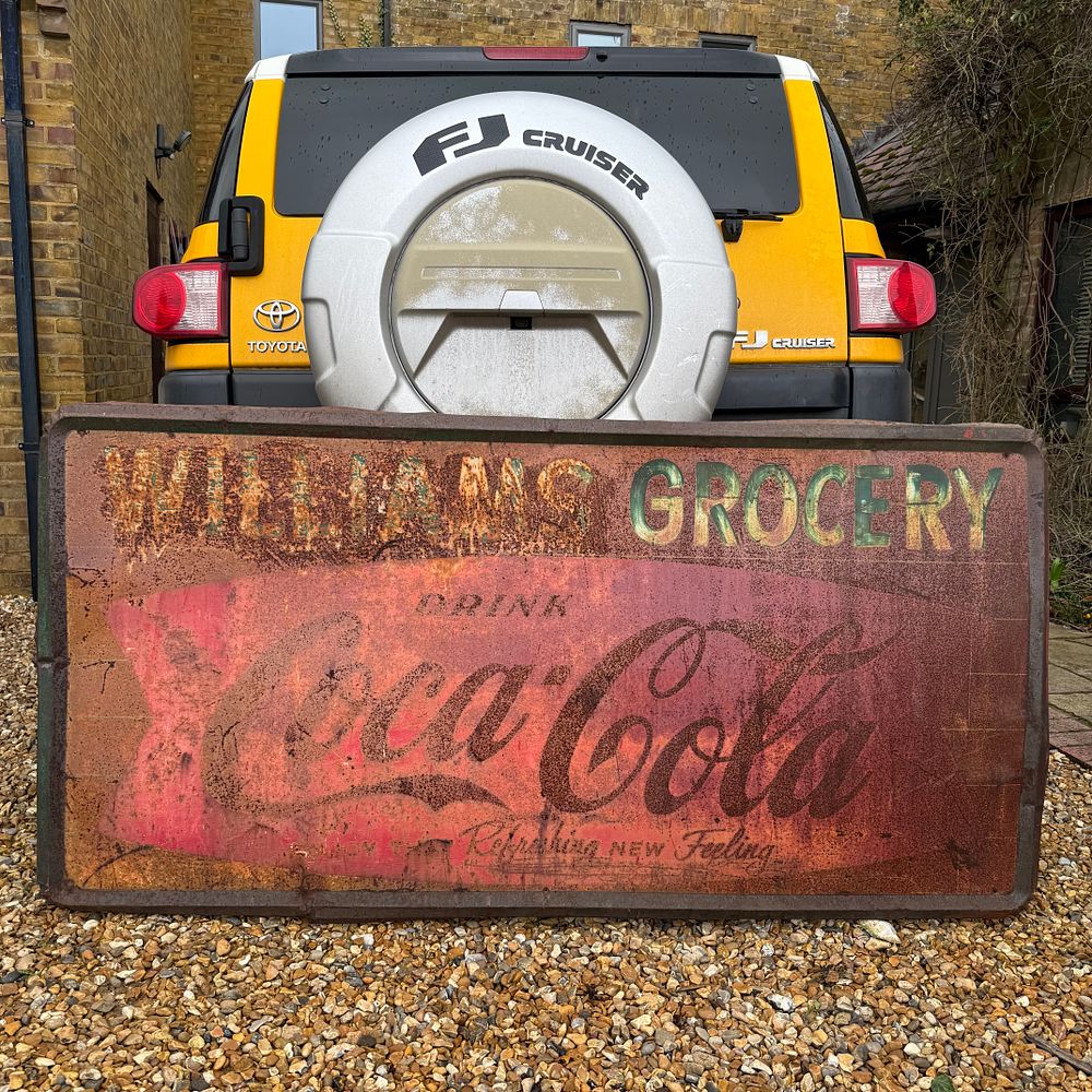 Lot 179: Coca-Cola Painted Metal Storefront Advertising Sign (from Route 66!)