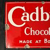 Cadbury's Chocolates Enamel Advertising Sign. Red ground with white lettering and border. Marked Image - 1