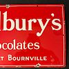 Cadbury's Chocolates Enamel Advertising Sign. Red ground with white lettering and border. Marked Image - 2
