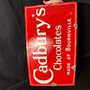 Cadbury's Chocolates Enamel Advertising Sign. Red ground with white lettering and border. Marked Image - 5
