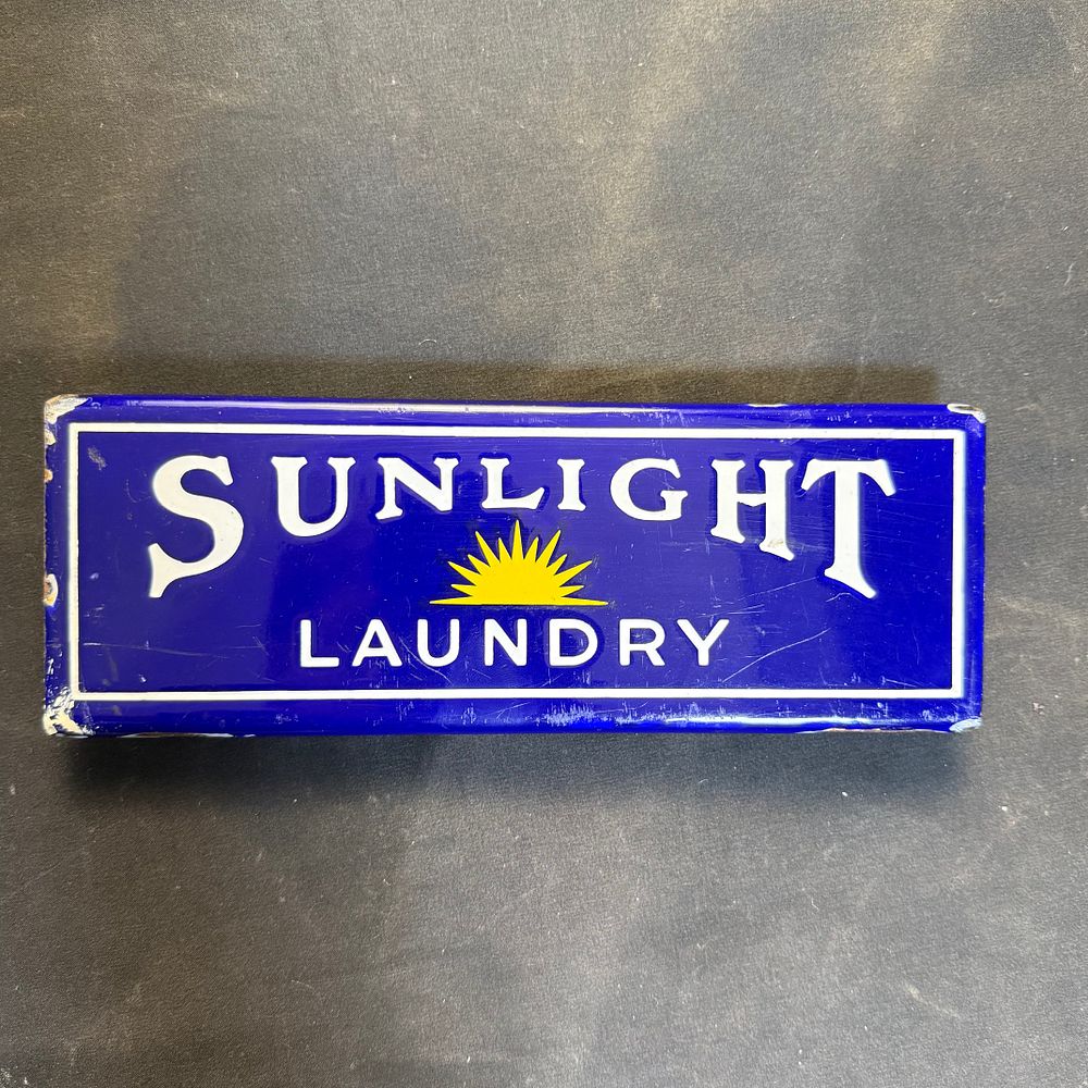 Lot 155: Sunlight Laundry Enamel Flanged Basket Sign