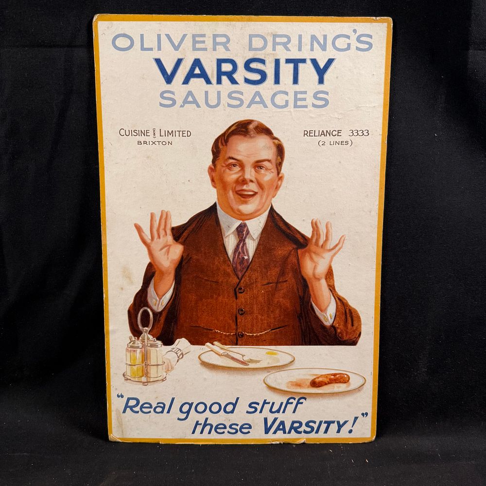 Lot 185: Oliver Dring's Varsity Sausages Lithographed Cardboard Advertising Sign