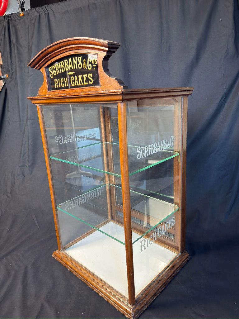 Lot 164: Scribbans & Co Rich Cakes Glass Cabinet.