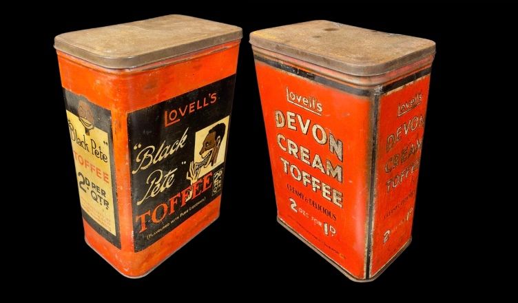 Lot 176: Pair of Vintage Lovell’s Toffee Tins – Black Pete & Devon Cream