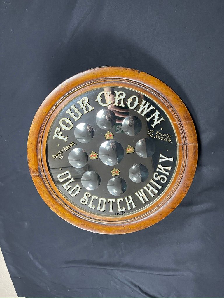 Lot 185: Four Crowns whiskey mirror