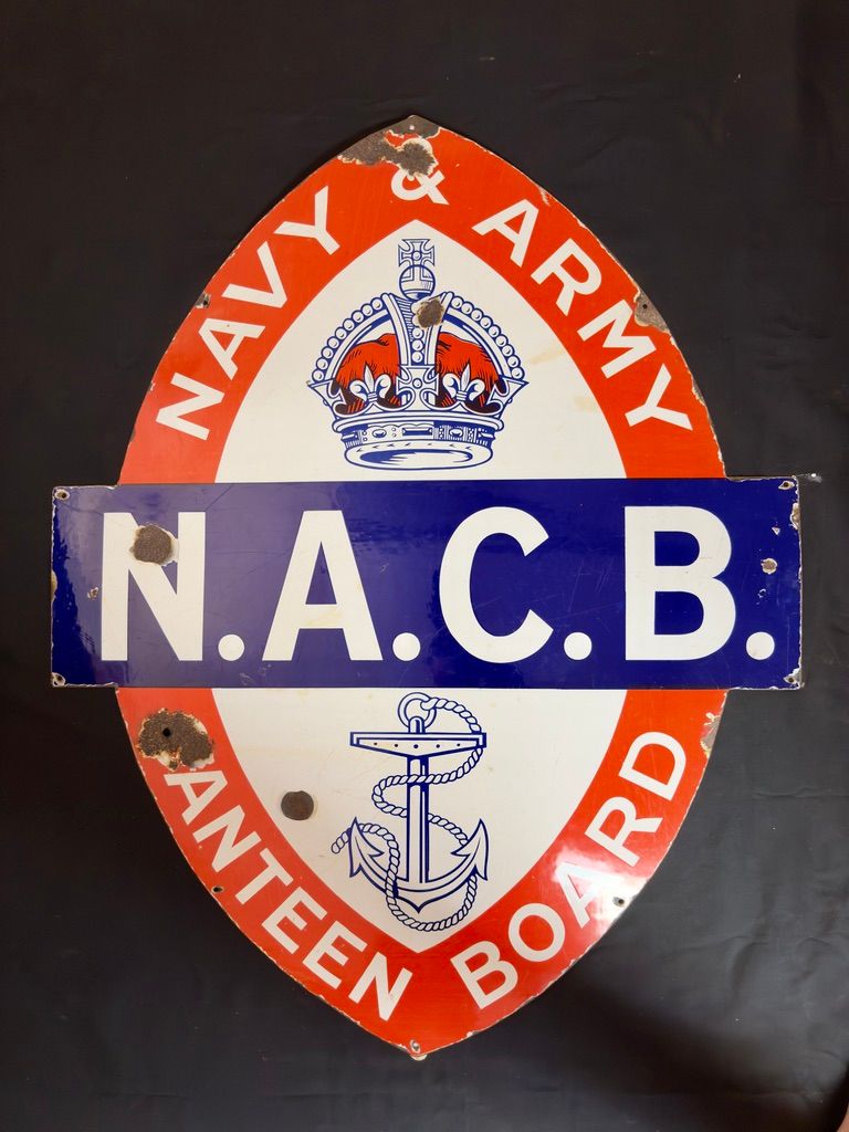 Lot 193: N.A.C.B Navy Army Canteen Board enamel sign