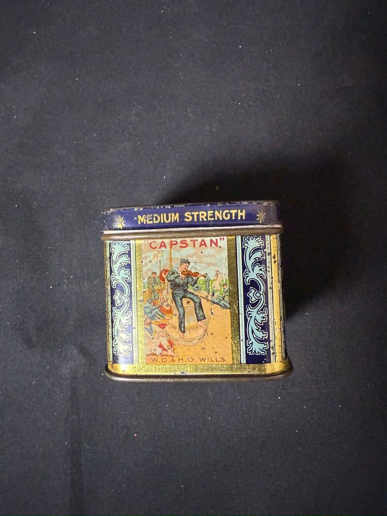 Lot 239: Capstan Tobacco Cube Tin – Sailor Pictorial