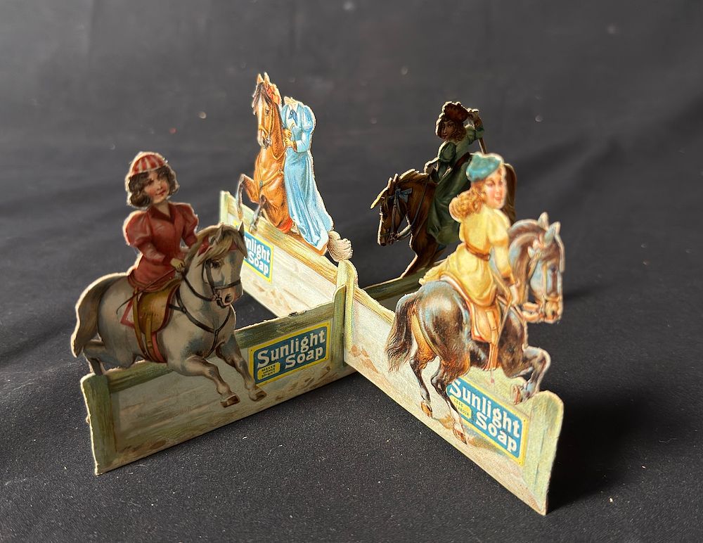 Lot 270: Sunlight Soap display together with periscope
