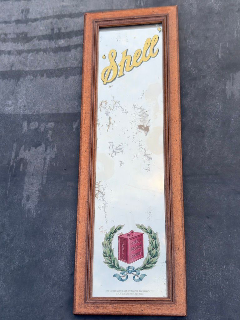 Lot 156: A Shell Advertising Mirror 1930's advertising Motor Spirit...