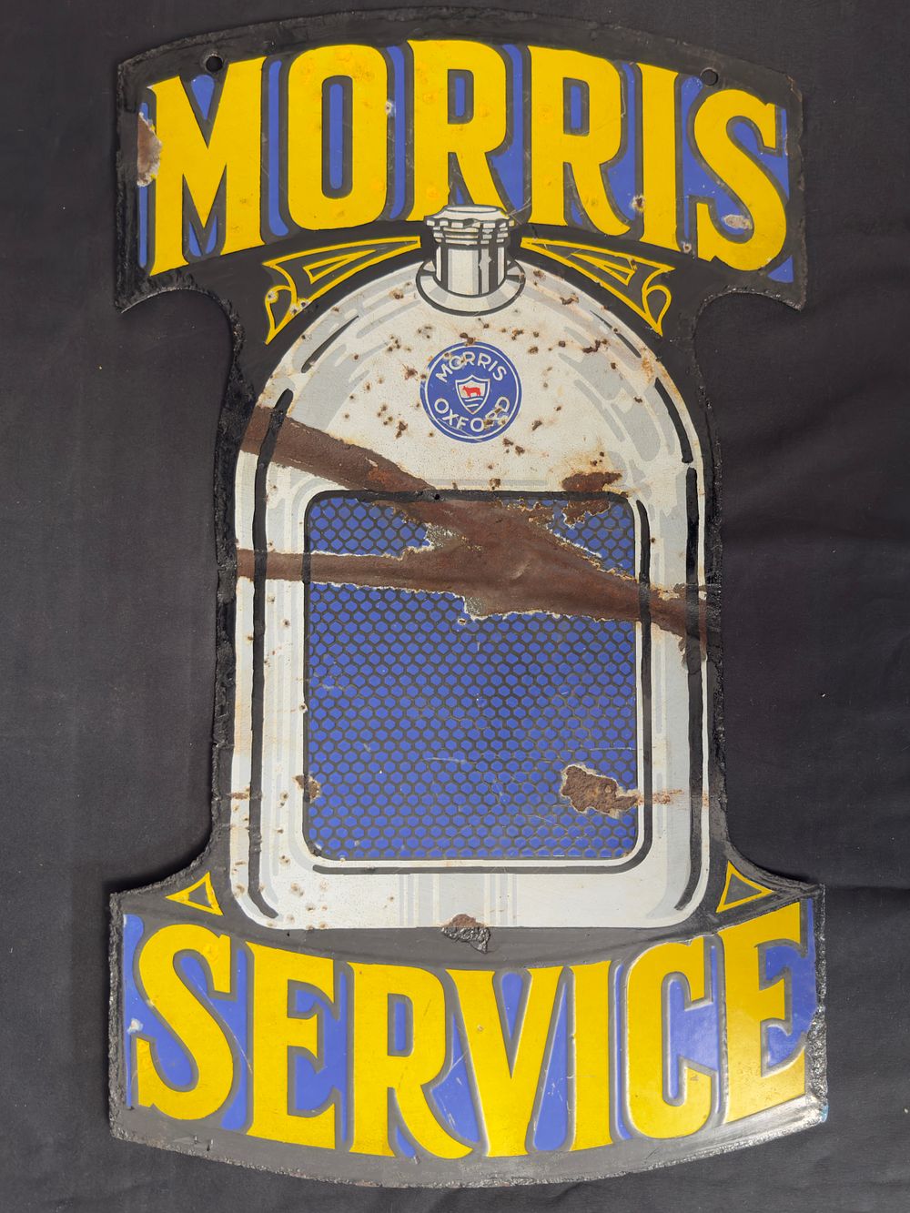 Lot 177: A Rare Double-sided Enamel Sign for Morris Service