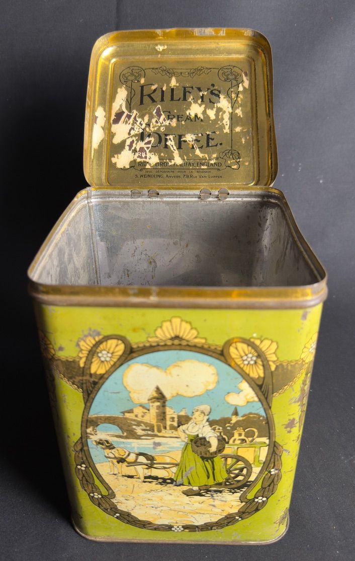 Lot 185: A Rileys Toffee tin with travel related images...
