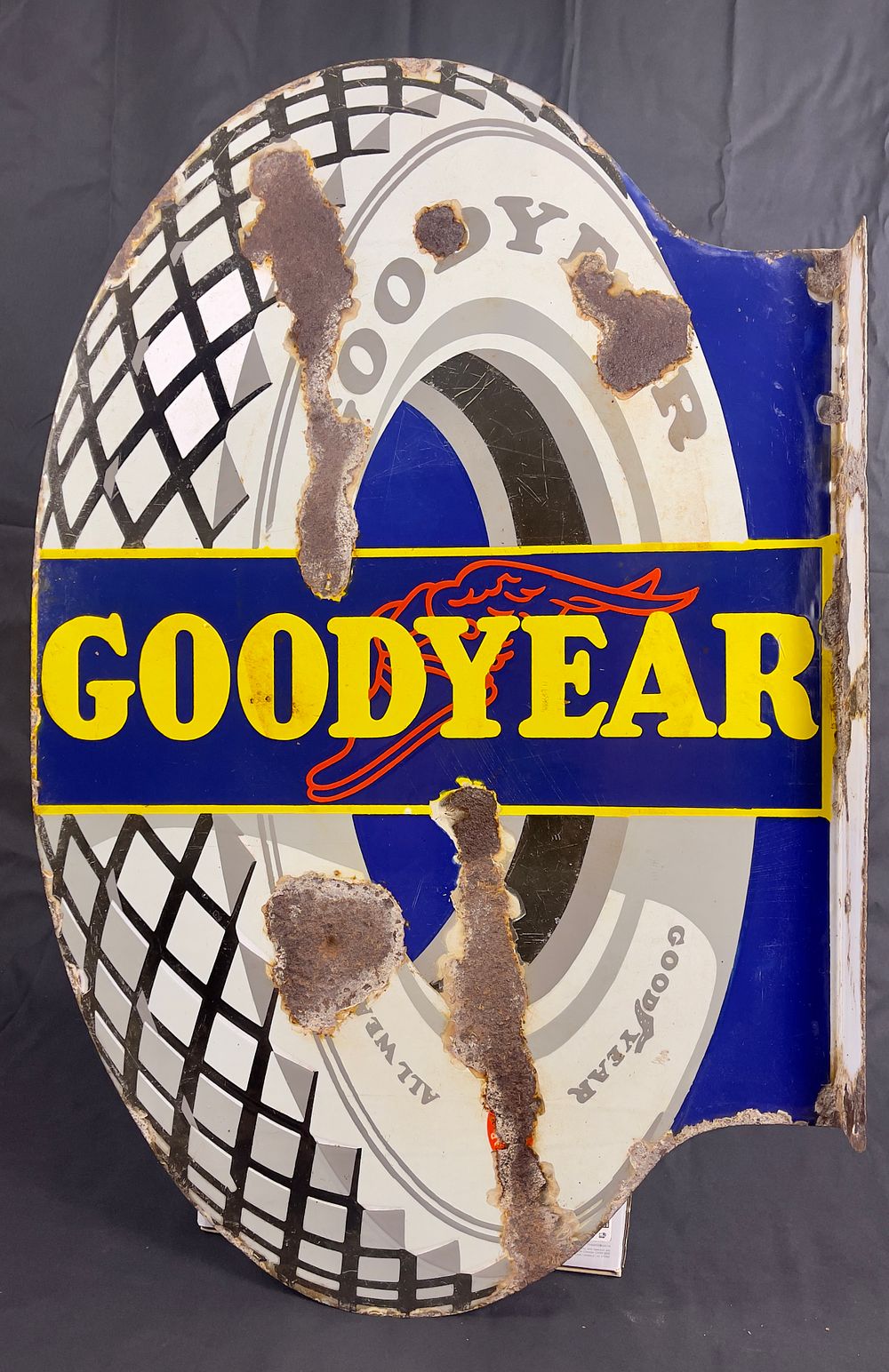 Lot 195: Goodyear All Weather Tyres Double-Sided Enamel Sign –...