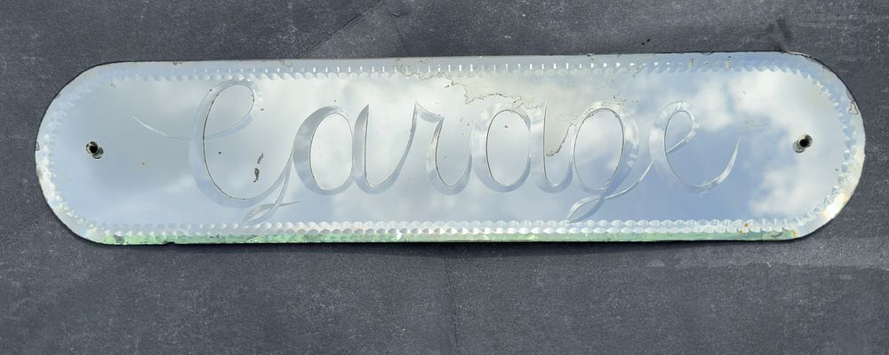 Lot 198: A Mirror stating "Garage' Early 20th century mirror...