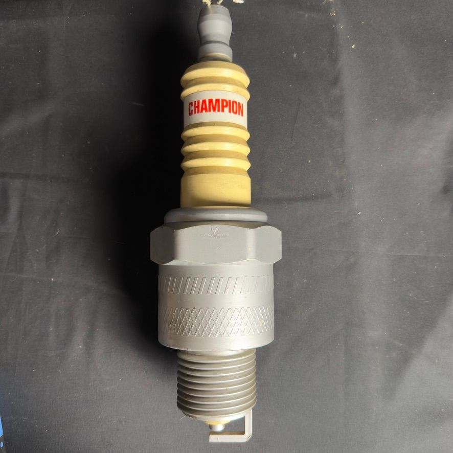 Lot 210: A Champion spark plug
