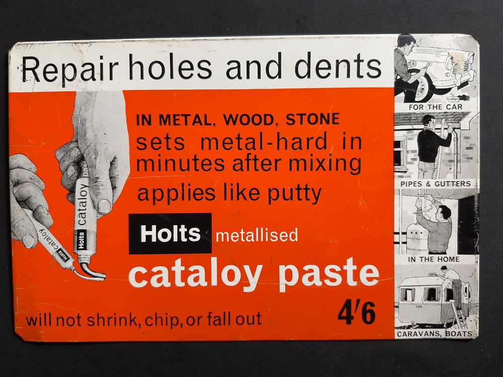 Lot 211: A Holts Holes & Dents sign