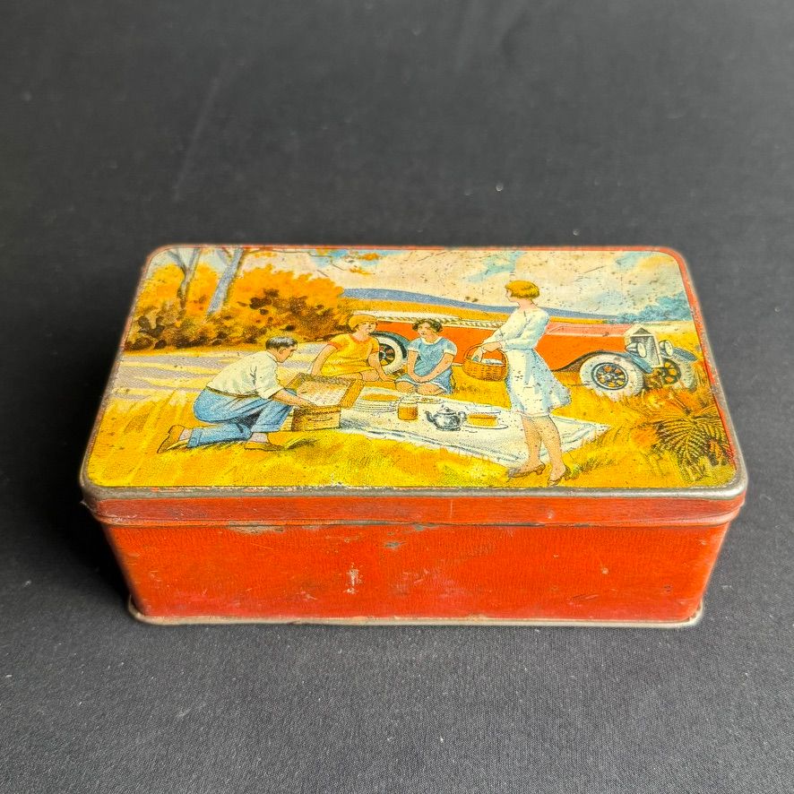 Lot 226: A Mackintosh's tin featuring various Motoring scenes A...