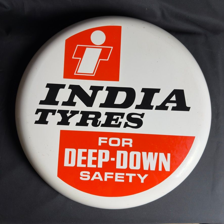 Lot 230: An India tyres round sign