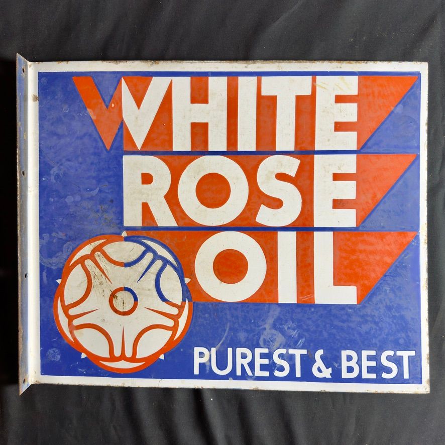 Lot 259: A White rose oil enamel flanged sign