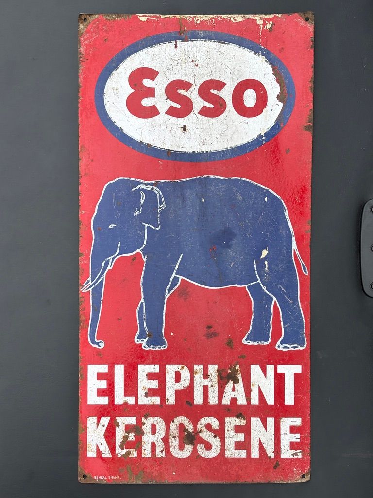 Lot 276: An Esso Kerosene Enamel Sign Features logo and...