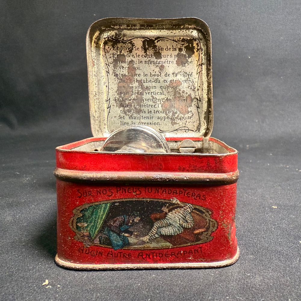 Lot 189: Michelin Tyre Pressure Gauge in Lithographed Metal Tin