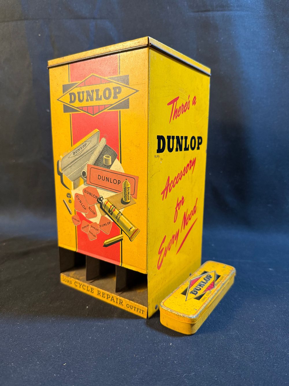 Lot 195: Two Dunlop Lithographed Tinplate Cycle Puncture Repair Items