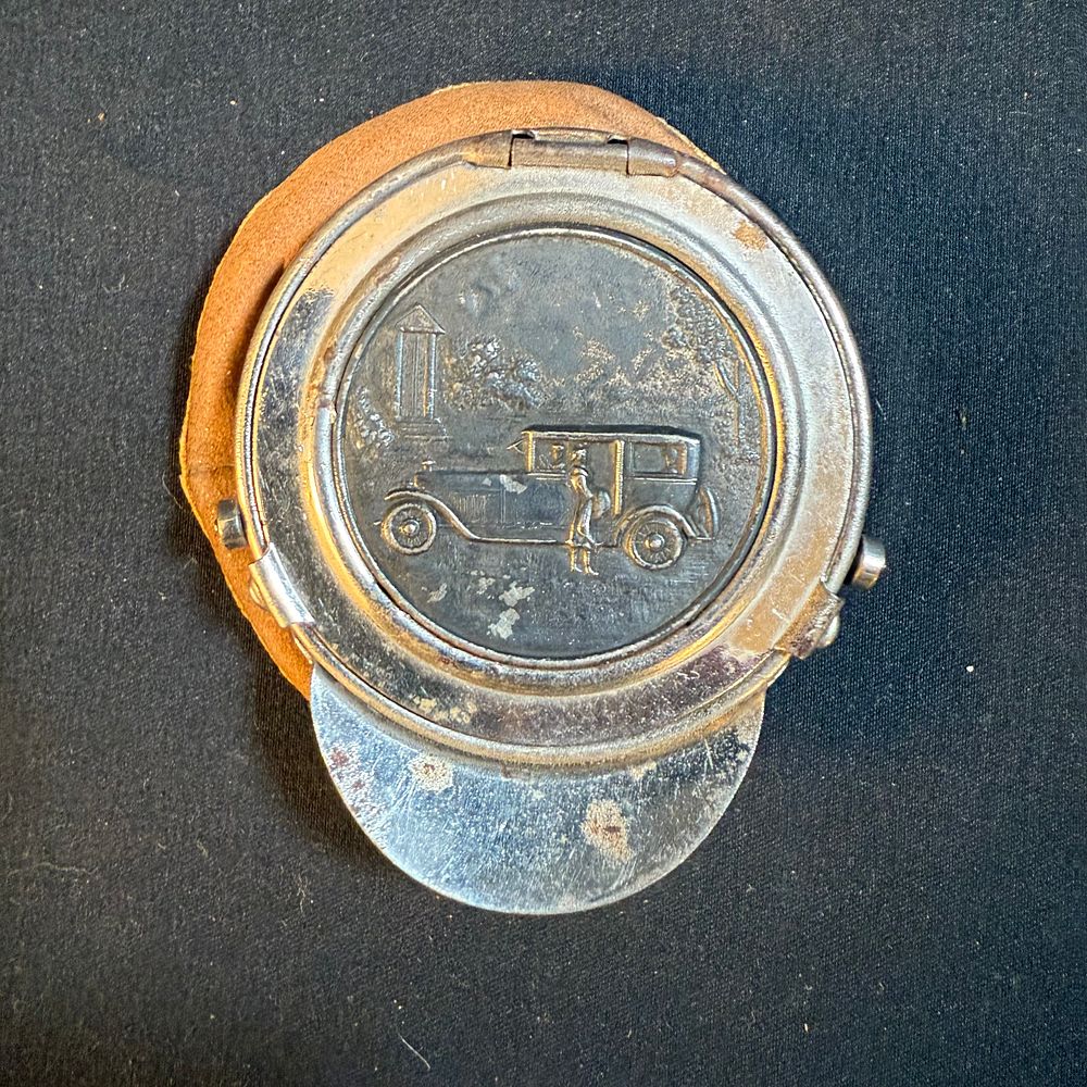 Lot 194: Leather Chauffeur's Cap Coin Purse with Early Automobile Relief