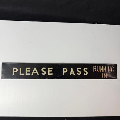 Painted Metal Automotive Running-In Sign. Narrow rectangular black metal running-in sign. 