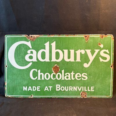 Cadbury's Enamel Advertising Sign. Deep green with bold white typography and white border. 