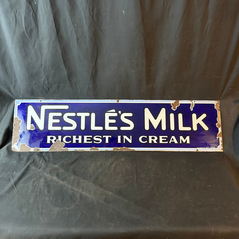 Lot 182: Nestlé's Milk Enamel Advertising Sign