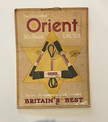 Orient Laces Lithographic Cardboard Advertising Showcard. Yellow star graphic surrounded by 