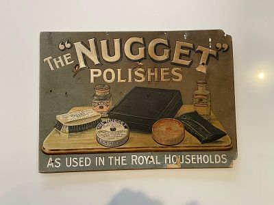 The Nugget Embossed Cardboard Advertising Display Sign. High-relief embossed graphics of shoe 