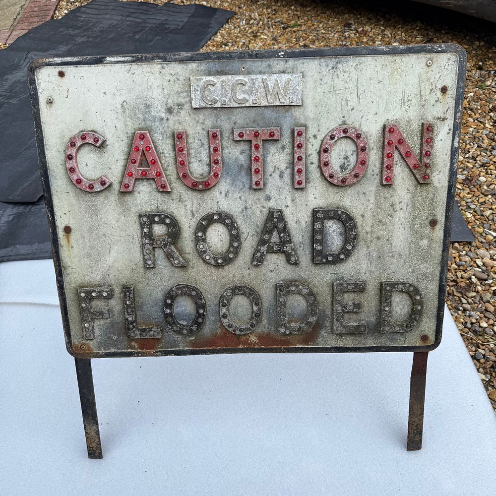 Lot 169: Metal Caution Road Flooded Sign with Reflective Studs