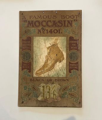 Moccasin Boots Lithographed Cardstock Advertising Showcard. Art Nouveau borders with 