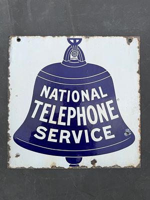 National Telephone Service Enamel Advertising Sign. White background with iconic dark blue Bell 