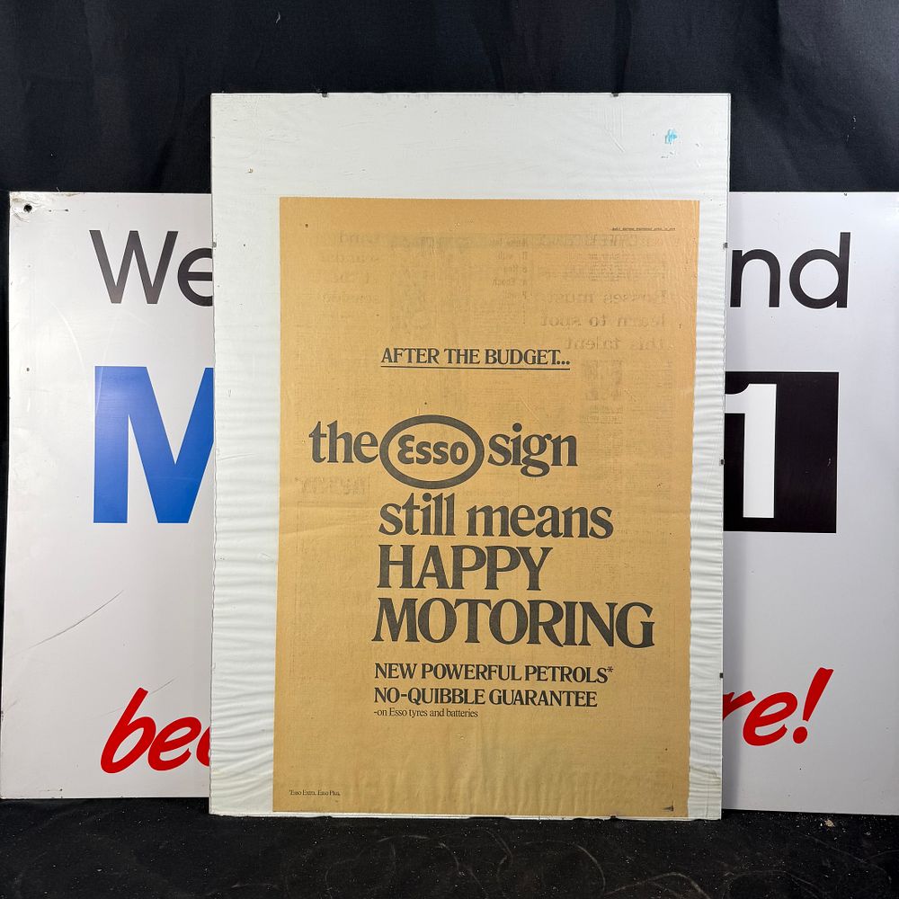 Lot 286: Mobil 1 Metal Sign and Esso Newspaper Advertisement