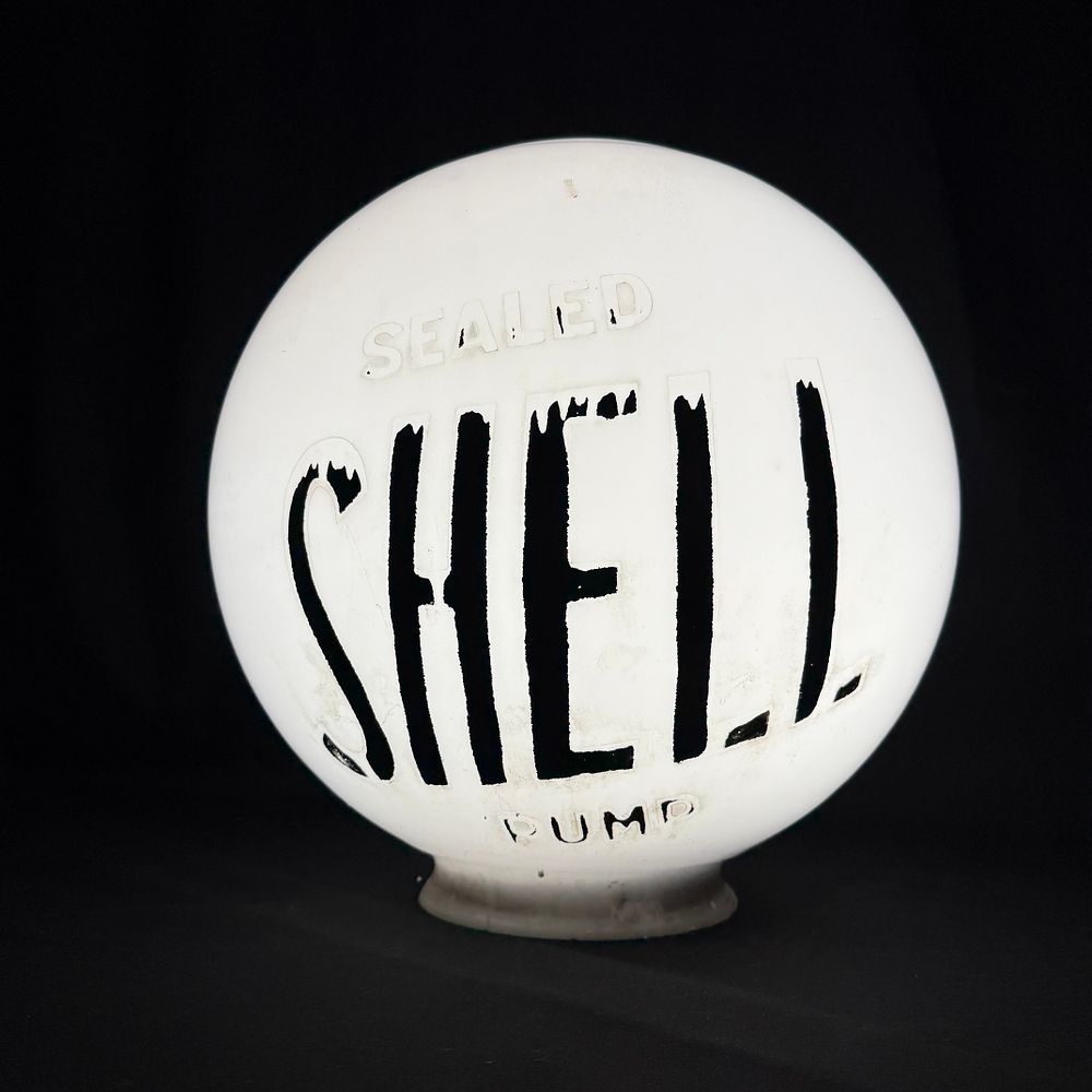 Lot 182: Sealed Shell Glass Petrol Pump Globe