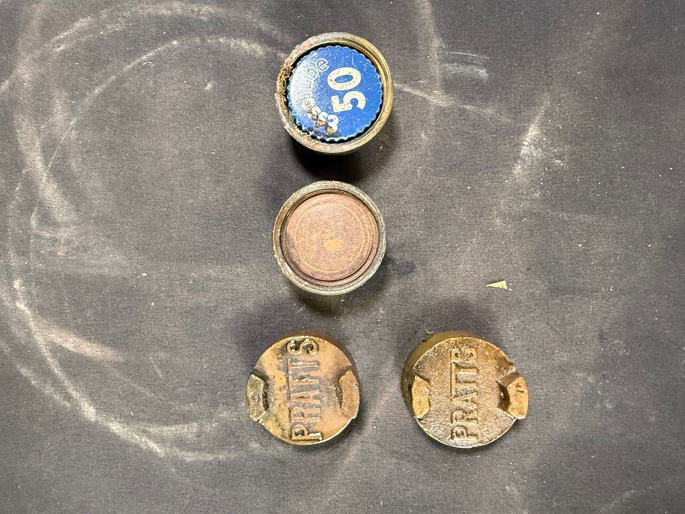 Lot 333: Pratt's Motor Spirit Petrol Can Caps and Seals Cast Brass