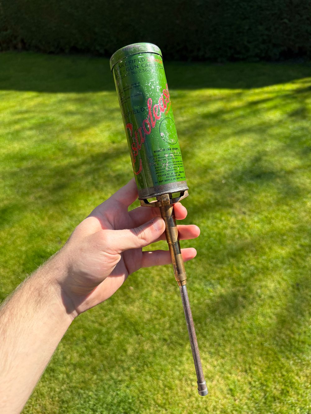 Lot 136: Wakefield Castrol Grease Gun Canister and Pump