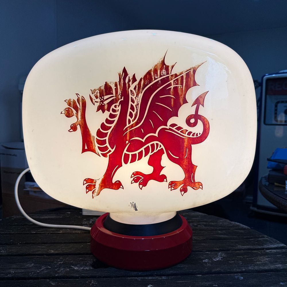 Lot 107: Welsh Dragon Petrol Pump Globe