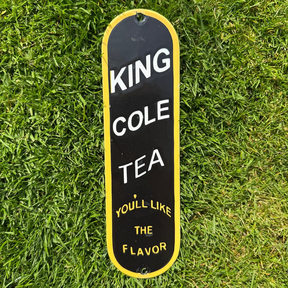 Lot 148: King Cole Tea Enamel Advertising Fingerplate, believed to be a reproduction.