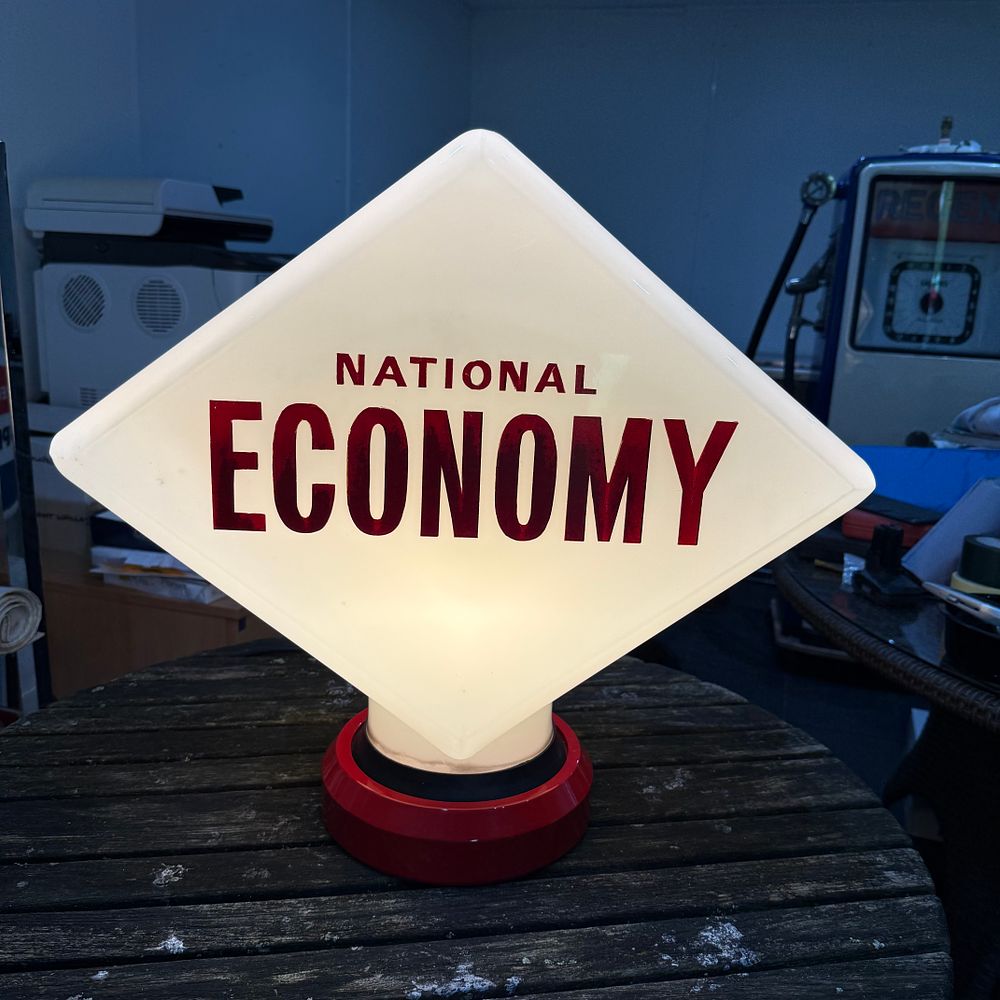 Lot 109: National Economy Petrol Pump Globe